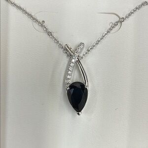 Sleek Black and Silver Gemstone Necklace with Accent Stones